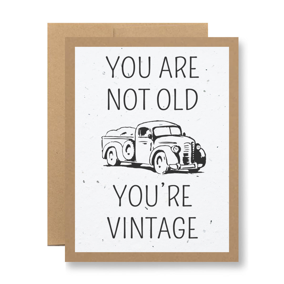 Check out My Store's Plantable Greeting Card. This eco-friendly card features an illustration of a vintage truck printed on recycled cardstock, with the text "You are not old, you're vintage." Set against a brown paper background, it beautifully blends nostalgic charm with sustainability.