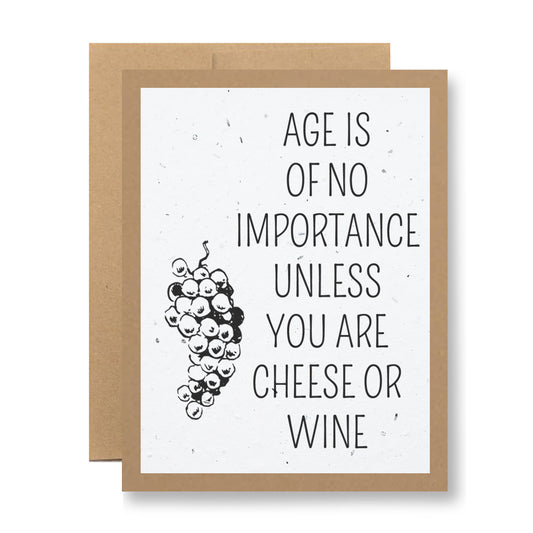 A Plantable Greeting Card by My Store is crafted from a recycled cardstock base, showcasing an illustration of a grape cluster on the left and the phrase "Age is of no importance unless you are cheese or wine" on the right.