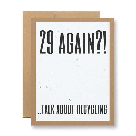 My Store's Plantable Greeting Card - 29 again?! Talk about recycling, features a humorous design with "29 AGAIN?!" at the top and "...TALK ABOUT RECYCLING" at the bottom, all set against a brown border. Made from eco-friendly wildflower seed paper, this card offers not only laughter but also the unique ability to be planted and grow into beautiful flowers, making it both memorable and biodegradable.