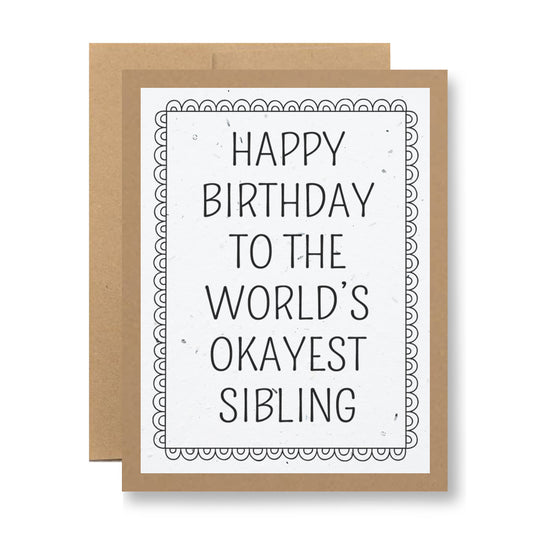 The "Plantable Greeting Card - ...to the world's okayest sibling" from My Store includes a brown envelope and showcases the playful text "Happy Birthday to the World’s Okayest Sibling" in a decorative font with a dotted scalloped border. Crafted from biodegradable materials, this eco-friendly card is both fun and sustainable.