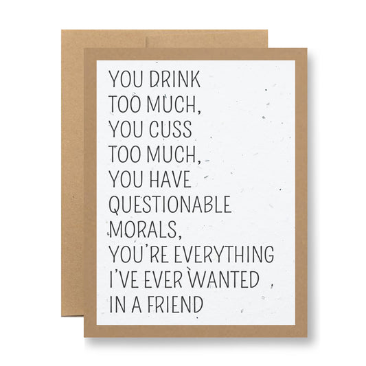 Check out this plantable greeting card from My Store, featuring a brown border and white center made from biodegradable seed paper. The text reads: "You drink too much, you cuss too much, you have questionable morals, you're everything I've ever wanted in a friend." Plant it to grow wildflowers!