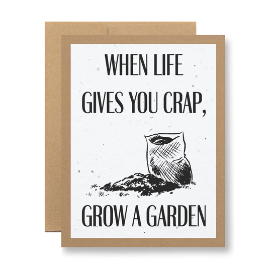 The "Plantable Greeting Card - When life gives you crap..." by My Store showcases an illustration of a bag of soil and a small pile of dirt alongside its inspirational message. Made from biodegradable card stock, this card comes with a plain brown envelope, ready to inspire.