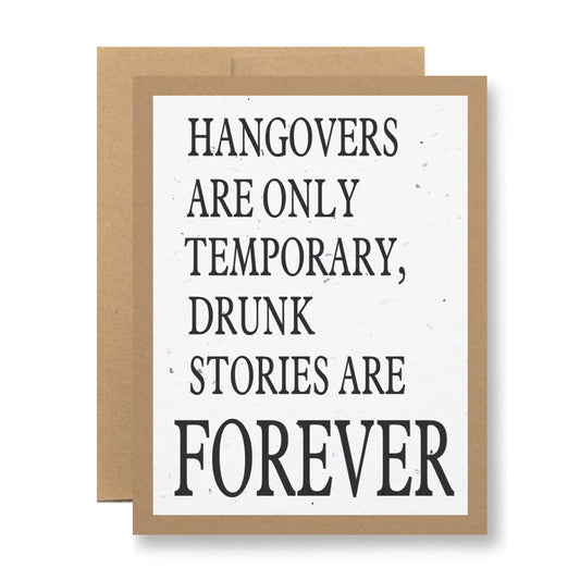 Introducing the Plantable Greeting Card by My Store: crafted from recycled cardstock, this eco-friendly card displays the bold black text "Hangovers are only temporary, drunk stories are forever" on a crisp white background and comes elegantly paired with a brown envelope.