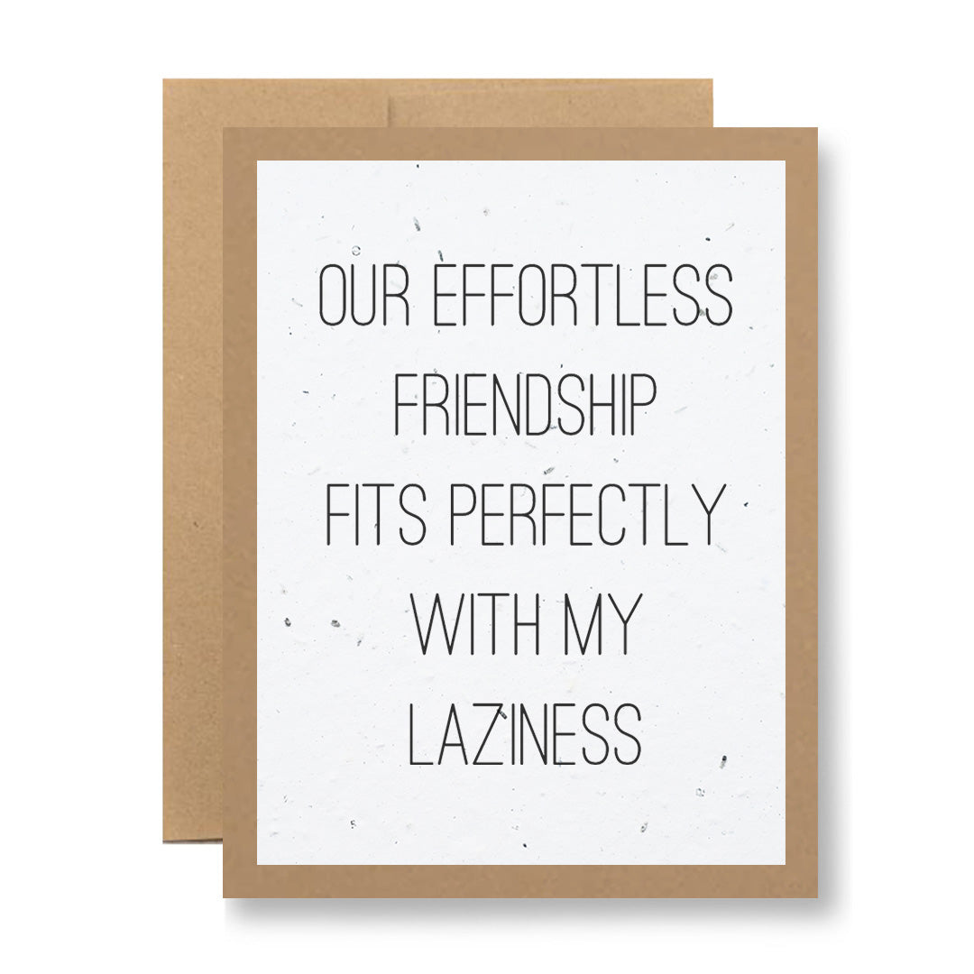 The Plantable Greeting Card by My Store, crafted from handmade seed paper with a brown border, features the message "Our effortless friendship fits perfectly with my laziness" in a simple font. This card includes a slightly larger brown envelope and is ready to bloom into wildflowers.