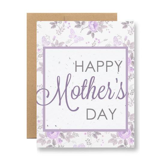 Introducing the Plantable Greeting Card - Happy Mother's Day by My Store: This environmentally-friendly card features "Happy Mother's Day" in purple text set against a white background, beautifully decorated with purple flowers and butterflies. Made from biodegradable seed paper, it comes in a brown envelope and can be planted to blossom into vibrant wildflowers.