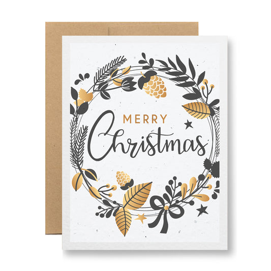 Product Description: Introducing the Plantable Greeting Card - Merry Christmas {golden wreath} by My Store. Featuring an elegant festive wreath design in gold and black on a white backdrop, this card centers around the heartfelt message "Merry Christmas." Made from wildflower seed embedded paper, the biodegradable greeting card is paired with a brown envelope, offering an eco-friendly touch to your holiday celebrations.